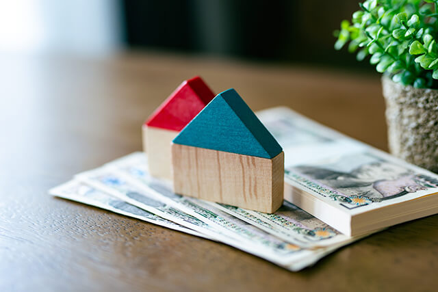 家の模型とお金