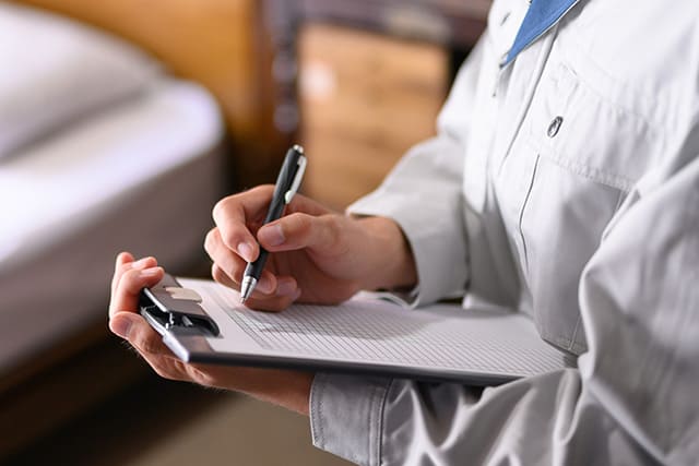 部屋と査定担当者